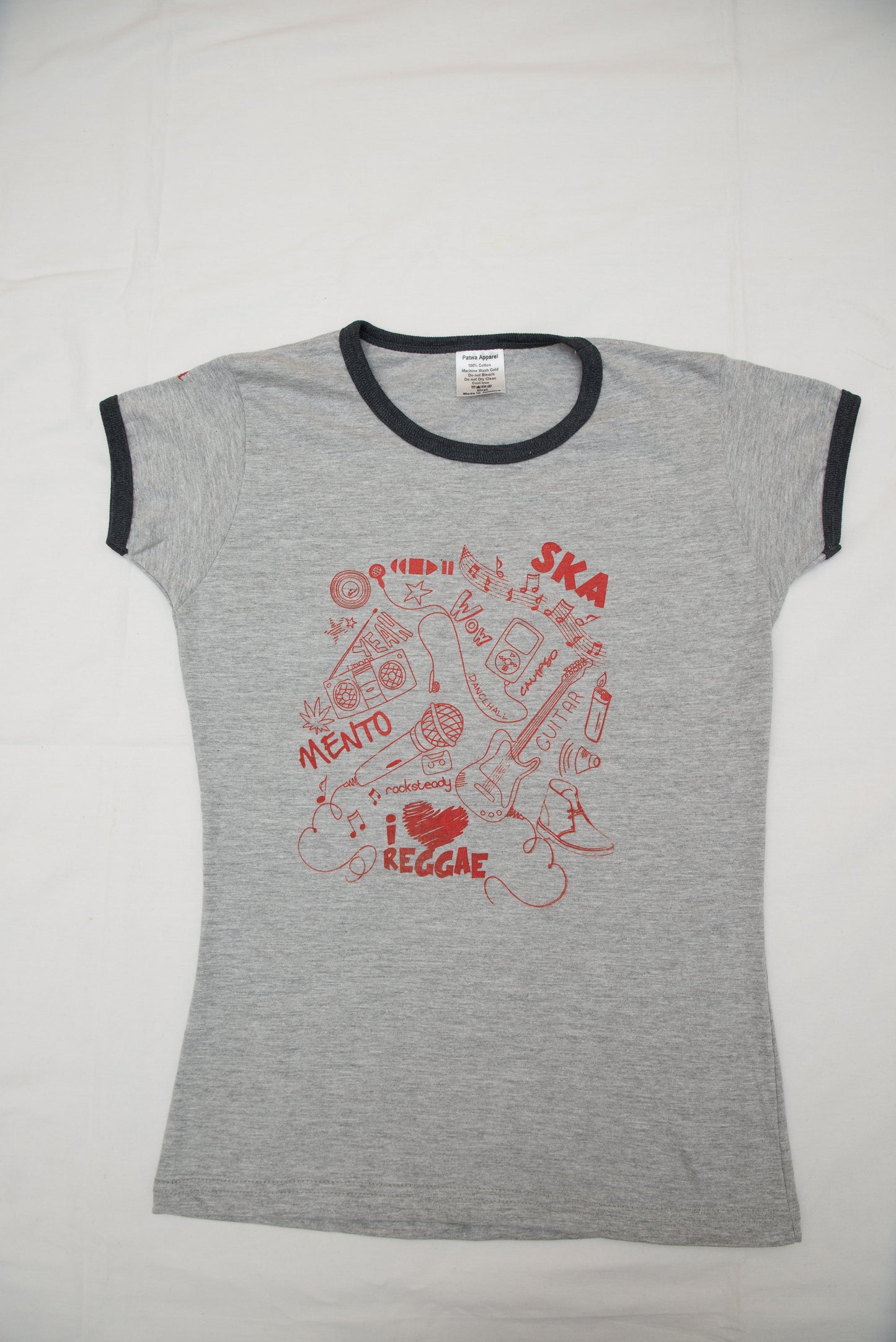 A t-shirt with the patois phrase Ska, Mento, Reggae